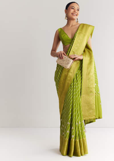 Pista Green Saree With Lehariya Print And Floral Gotapatti And Moti Work.