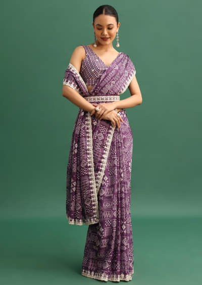 Purple Printed Satin Saree With Sequins Embroidered Border And Unstitched Blouse